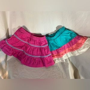 A pair of fun, brightly colored skirts